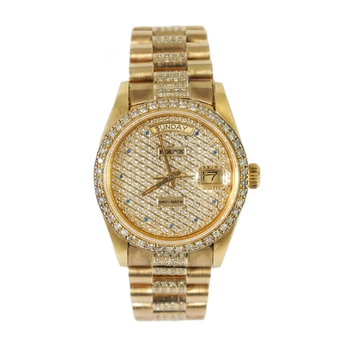 354 - A GENTLEMAN’S 18CT GOLD DIAMOND AND SAPPHIRE ROLEX PRESIDENT DAY/DATE WRISTWATCH on 18ct gold and di... 