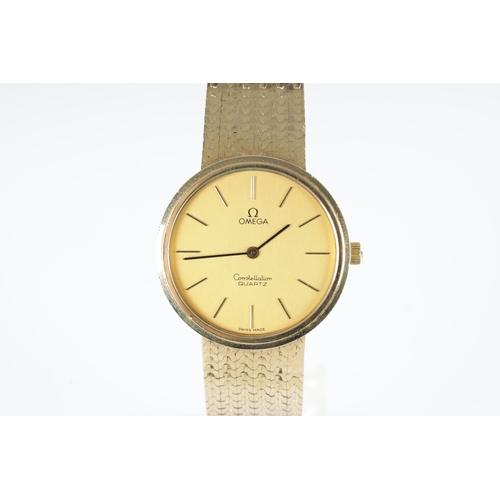 366 - A 9CT GOLD OMEGA CONSTELLATION GENTLEMANS QUARTZ WRISTWATCH ON A MILANESE STYLE BRACELET WITH LADDER... 