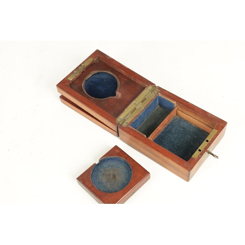 391 - A 19TH CENTURY MAHOGANY POCKET WATCH HOLDER with a hinged top and lift-out holder. (9cm wide 11cm de... 