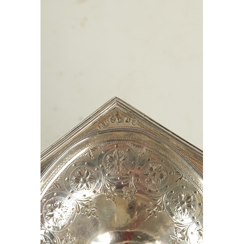 404 - A GEORGE III SILVER SWEETMEAT BASKET the ovoid octagonal shaped dish with bright cut decoration and ... 