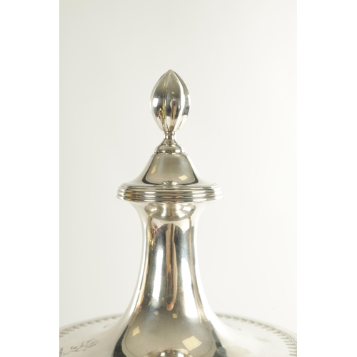 406 - A GEORGE III ADAM DESIGN SILVER TEA URN the concave panelled tapering body with raised ribbed leaf c... 