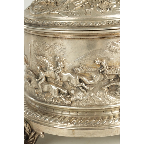 410 - A LARGE ELKINGTON & CO STYLE SILVER PLATE CIRCULAR CASKET DEPICTING HORSES AND HORSEMEN with pull-of... 