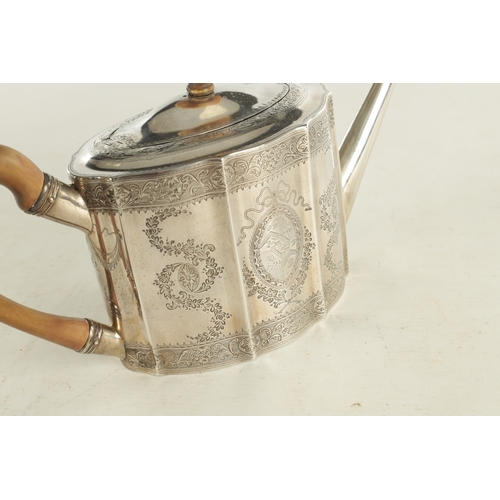 414 - A GEORGE III SILVER TEAPOT of bright-cut shaped octagonal form with tapered spout, shaped pearwood h... 