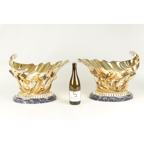 417 - A FINE AND IMPRESSIVE PAIR OF ELIZABETH II SILVER GILT SHELLWORK CHAMPAGNE COOLERS the bodies suppor... 