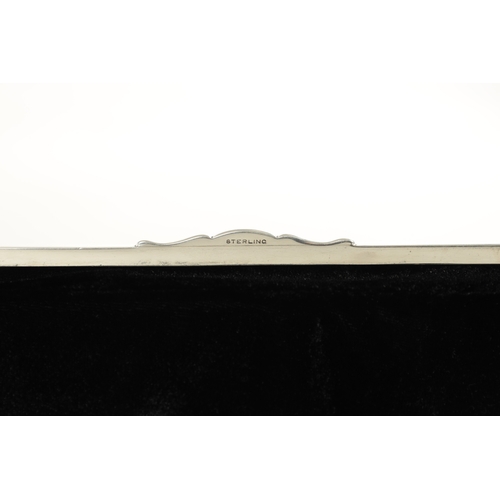 421 - A STERLING SILVER JEWELLERY/DOCUMENT BOX of slender rectangular form with a domed hinge cover, lined... 