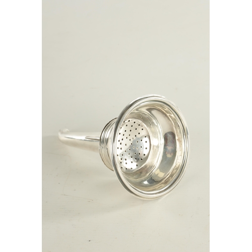 428 - AN EARLY 19TH CENTURY SCOTTISH SILVER WINE FUNNEL with dished moulded edge top, with cast shell deco... 