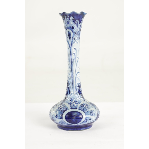 43 - A LATE 19TH CENTURY MOORCROFT FLORIAN WARE SMALL CABINET VASE the shallow body with tapered frill-ed... 