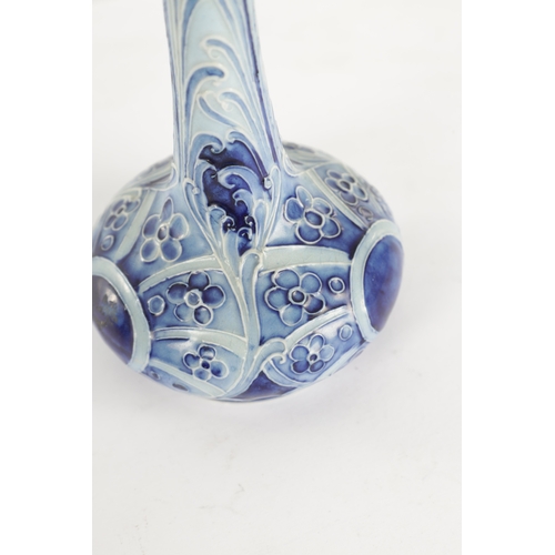 43 - A LATE 19TH CENTURY MOORCROFT FLORIAN WARE SMALL CABINET VASE the shallow body with tapered frill-ed... 