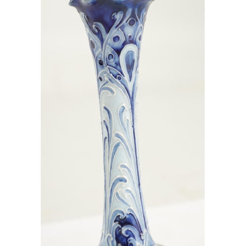 43 - A LATE 19TH CENTURY MOORCROFT FLORIAN WARE SMALL CABINET VASE the shallow body with tapered frill-ed... 