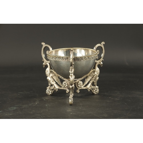 430 - A STYLISH EARLY 20TH CENTURY SILVER-PLATED DISH ON STAND with acanthus leaf border raised on griffin... 