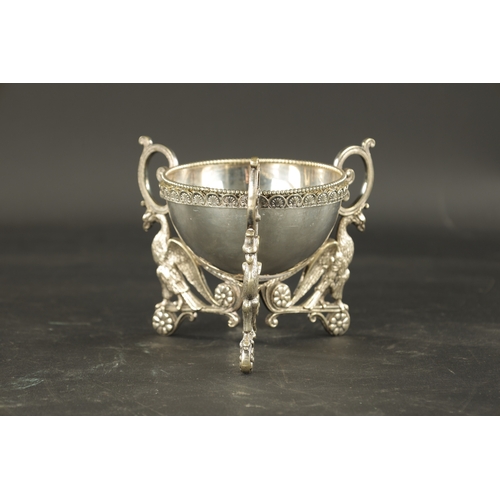 430 - A STYLISH EARLY 20TH CENTURY SILVER-PLATED DISH ON STAND with acanthus leaf border raised on griffin... 