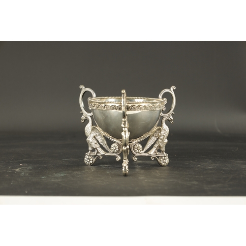 430 - A STYLISH EARLY 20TH CENTURY SILVER-PLATED DISH ON STAND with acanthus leaf border raised on griffin... 