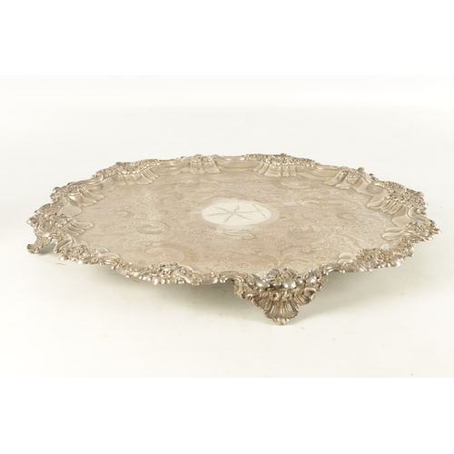 439 - A LARGE 19TH CENTURY OLD SHEFFIELD SIVER-PLATED TRAY with rococo style leaf and shell decorated bord... 