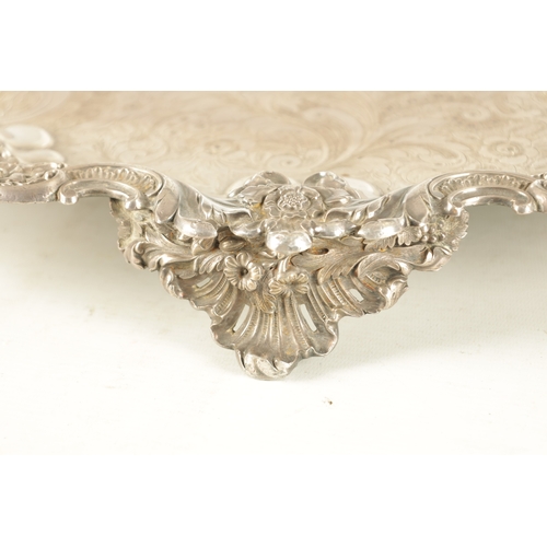 439 - A LARGE 19TH CENTURY OLD SHEFFIELD SIVER-PLATED TRAY with rococo style leaf and shell decorated bord... 