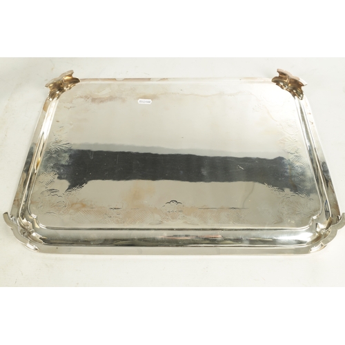 441 - A LARGE MID 20TH CENTURY SILVER RECTANGULAR TRAY with clipped corners and shell engraved border rais... 