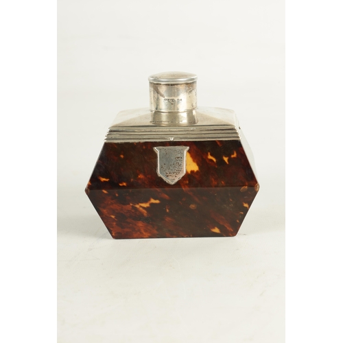 446 - A LATE 19TH CENTURY SILVER AND TORTOISESHELL TEA CADDY with angled silver top and push on lid above ... 