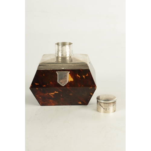 446 - A LATE 19TH CENTURY SILVER AND TORTOISESHELL TEA CADDY with angled silver top and push on lid above ... 