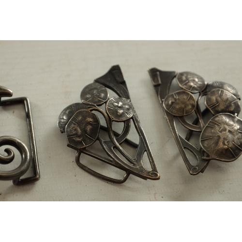 453 - A COLLECTION OF TEN 19TH CENTURY ART NOUVEAU SILVER AND SILVER METAL BELT BUCKLES of varying designs... 