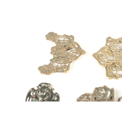 453 - A COLLECTION OF TEN 19TH CENTURY ART NOUVEAU SILVER AND SILVER METAL BELT BUCKLES of varying designs... 