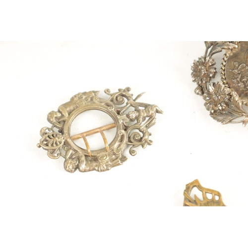 453 - A COLLECTION OF TEN 19TH CENTURY ART NOUVEAU SILVER AND SILVER METAL BELT BUCKLES of varying designs... 