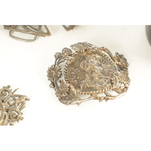 453 - A COLLECTION OF TEN 19TH CENTURY ART NOUVEAU SILVER AND SILVER METAL BELT BUCKLES of varying designs... 