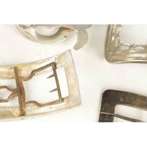 457 - A COLLECTION OF EIGHT 19TH CENTURY SILVER AND SILVER METAL BELT BUCKLES of varying designs (9.5cm lo... 