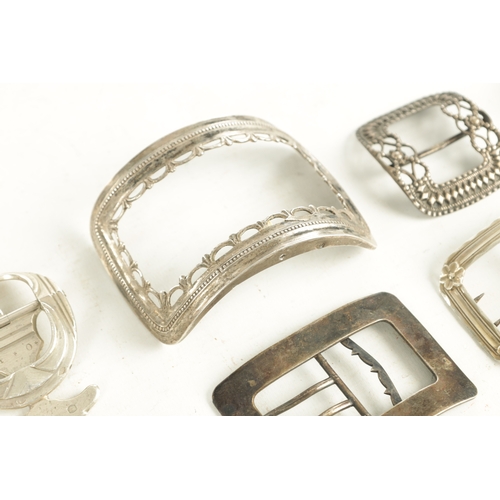 457 - A COLLECTION OF EIGHT 19TH CENTURY SILVER AND SILVER METAL BELT BUCKLES of varying designs (9.5cm lo... 