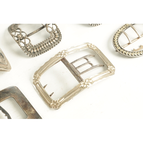 457 - A COLLECTION OF EIGHT 19TH CENTURY SILVER AND SILVER METAL BELT BUCKLES of varying designs (9.5cm lo... 