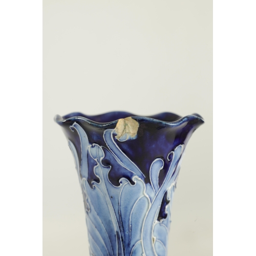 46 - A PAIR OF LATE 19TH CENTURY MOORCROFT FLORIAN WARE CABINET VASES the shallow tall tapering stems wit... 