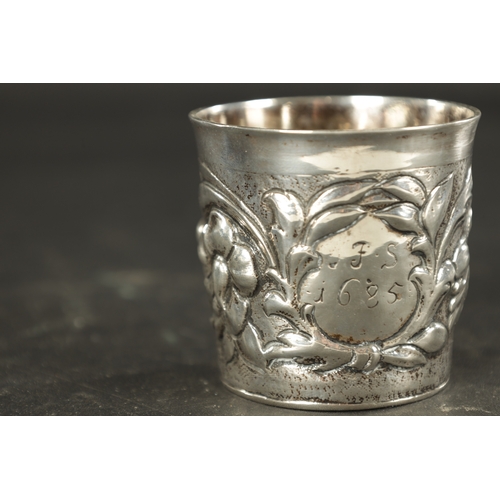 460 - A LATE 17TH CENTURY SCANDINAVIAN SILVER BEAKER embossed with flowers and contemporary cartouche engr... 