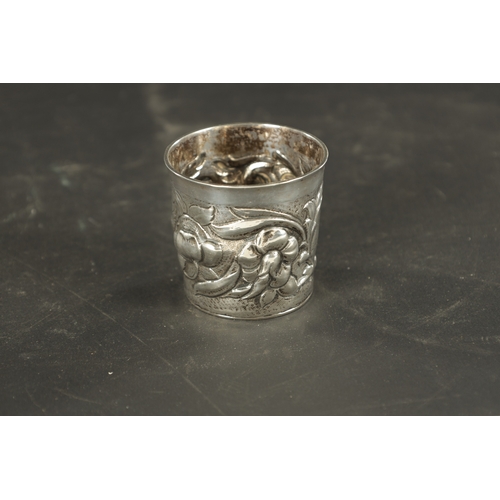 460 - A LATE 17TH CENTURY SCANDINAVIAN SILVER BEAKER embossed with flowers and contemporary cartouche engr... 