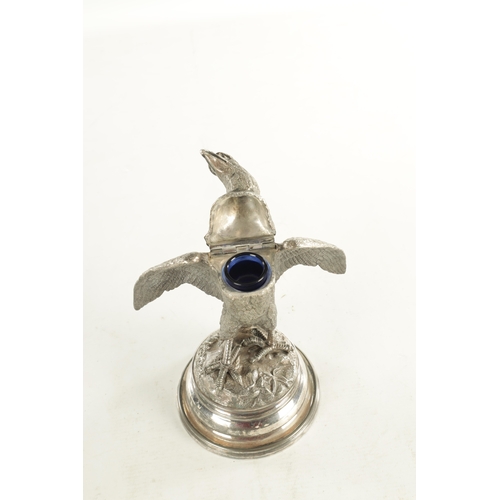 462 - A 19TH CENTURY SILVER PLATED OLD SHEFFIELD INKWELL formed as an eagle with hinged head and raised on... 