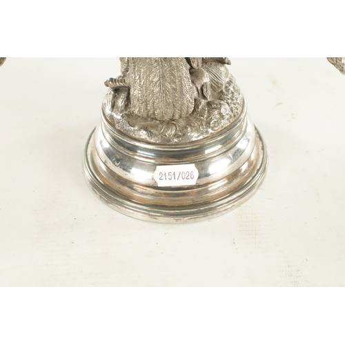 462 - A 19TH CENTURY SILVER PLATED OLD SHEFFIELD INKWELL formed as an eagle with hinged head and raised on... 