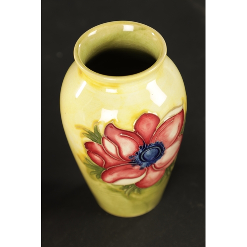 48 - TWO MOORCROFT VASES AND A BLUSH IVORY ROYAL WORCESTER JUG (14cm high and smaller )