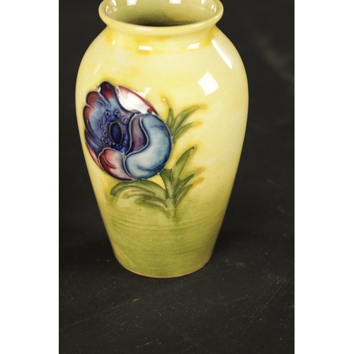 48 - TWO MOORCROFT VASES AND A BLUSH IVORY ROYAL WORCESTER JUG (14cm high and smaller )