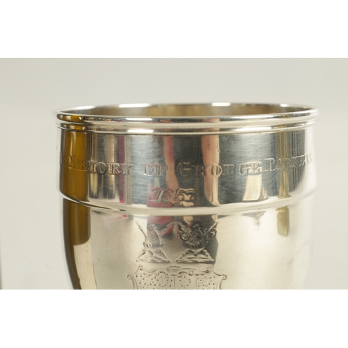 481 - AN EARLY VICTORIAN SILVER GOBLET of plain engraved crested design with inscribed date, on a ribbed p... 