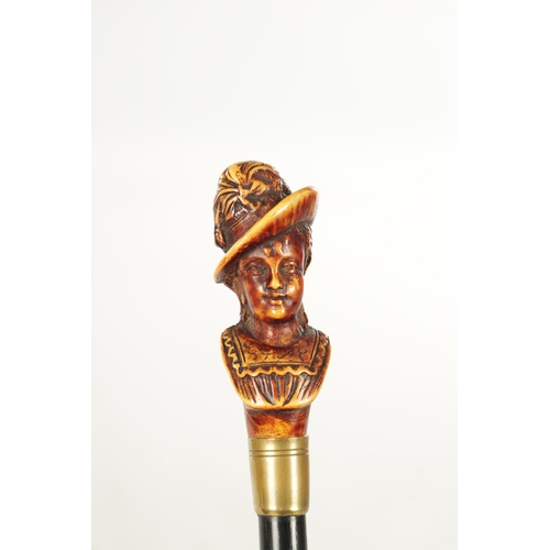 497 - AN EARLY 20TH CENTURY AMUSING CARVED MASK HANDLED WALKING STICK stamped 