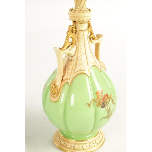 50 - A FINE AND UNUSUAL PAIR OF ROYAL WORCESTER CABINET VASES the sage green lobed panelled bodies finely... 