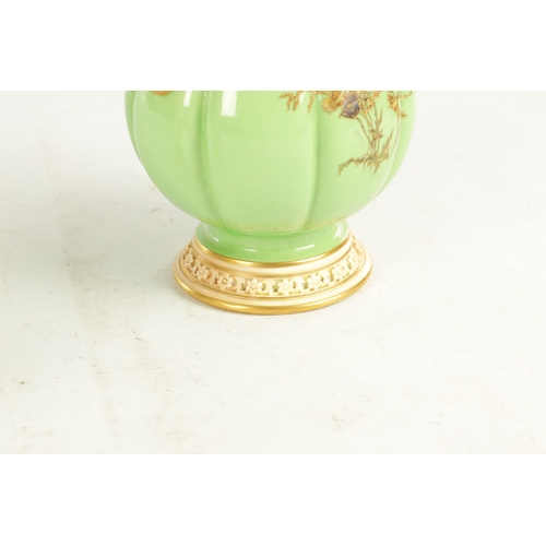 50 - A FINE AND UNUSUAL PAIR OF ROYAL WORCESTER CABINET VASES the sage green lobed panelled bodies finely... 