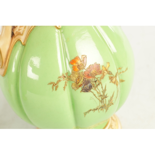 50 - A FINE AND UNUSUAL PAIR OF ROYAL WORCESTER CABINET VASES the sage green lobed panelled bodies finely... 