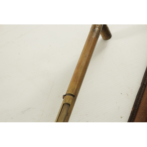 503 - A VINTAGE BRASS GRAIN PROBE WALKING STICK with a twisting handle engraved with initials D.A. & T.I. ... 