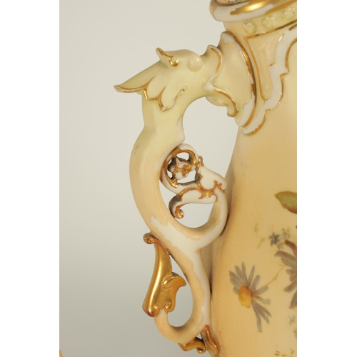 52 - AN ORNATE ROYAL WORCESTER GILT AND IVORY GROUND SCROLLED TWO-HANDLED CABINET VASE AND COVER of bulbo... 