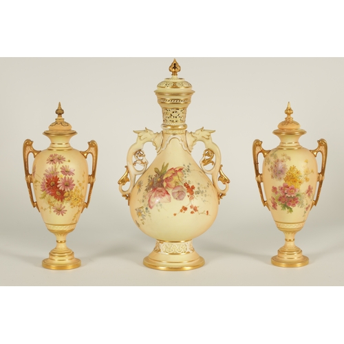 52 - AN ORNATE ROYAL WORCESTER GILT AND IVORY GROUND SCROLLED TWO-HANDLED CABINET VASE AND COVER of bulbo... 