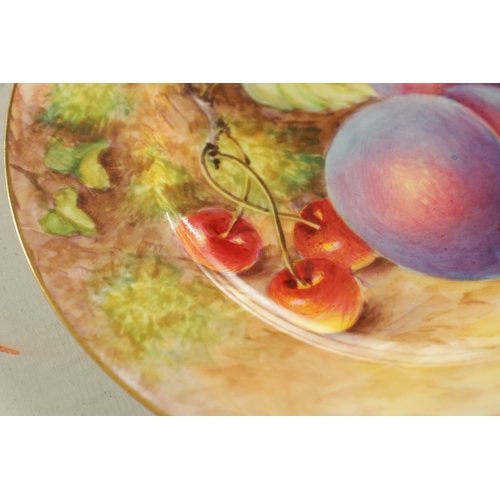 59 - A PAIR OF MID 20TH CENTURY ROYAL WORCESTER CABINET PLATES PAINTED WITH FRUIT signed Freeman with bla... 