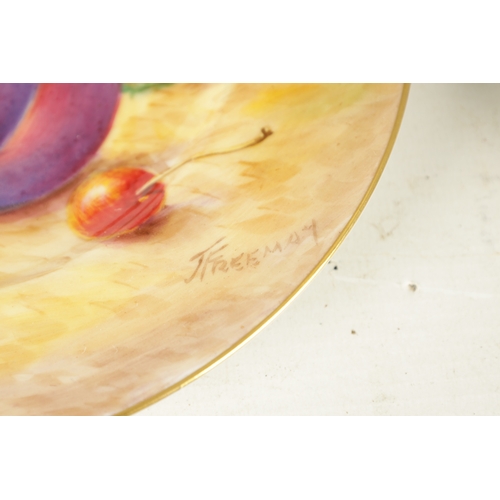 59 - A PAIR OF MID 20TH CENTURY ROYAL WORCESTER CABINET PLATES PAINTED WITH FRUIT signed Freeman with bla... 