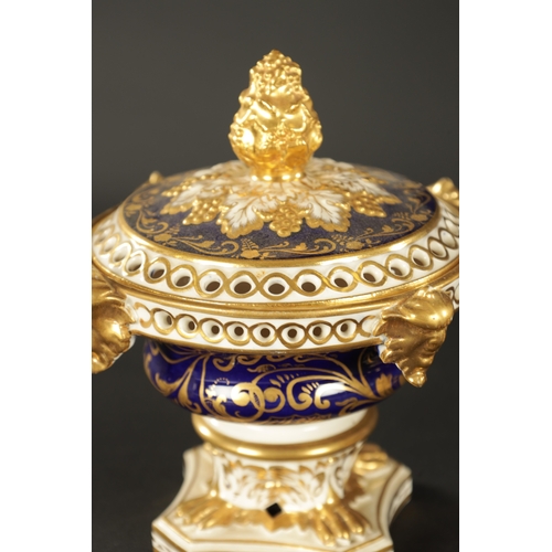 65 - A SET OF THREE 19TH CENTURY ROYAL CROWN DERBY POTPOURRI VASES, having pineapple finials and gilt mas... 