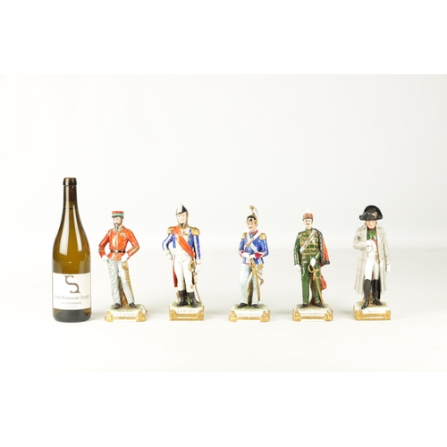 69 - A GROUP OF FIVE SAXONY GERMAN PORCELAIN FIGURES comprising Napoleon and Mortier and three soldiers (... 