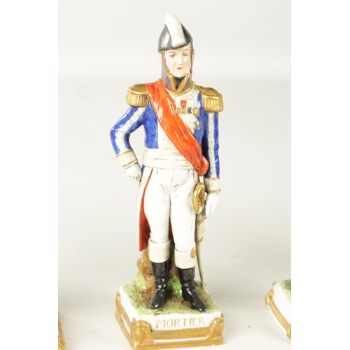 69 - A GROUP OF FIVE SAXONY GERMAN PORCELAIN FIGURES comprising Napoleon and Mortier and three soldiers (... 