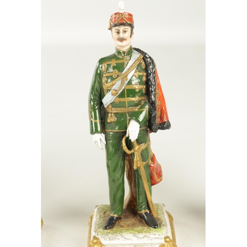 69 - A GROUP OF FIVE SAXONY GERMAN PORCELAIN FIGURES comprising Napoleon and Mortier and three soldiers (... 