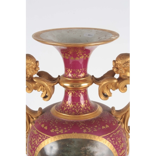 72 - AN IMPRESSIVE 19TH CENTURY VIENNA STYLE PORCELAIN HALL VASE the pedestal ovoid body with gilt mask-h... 